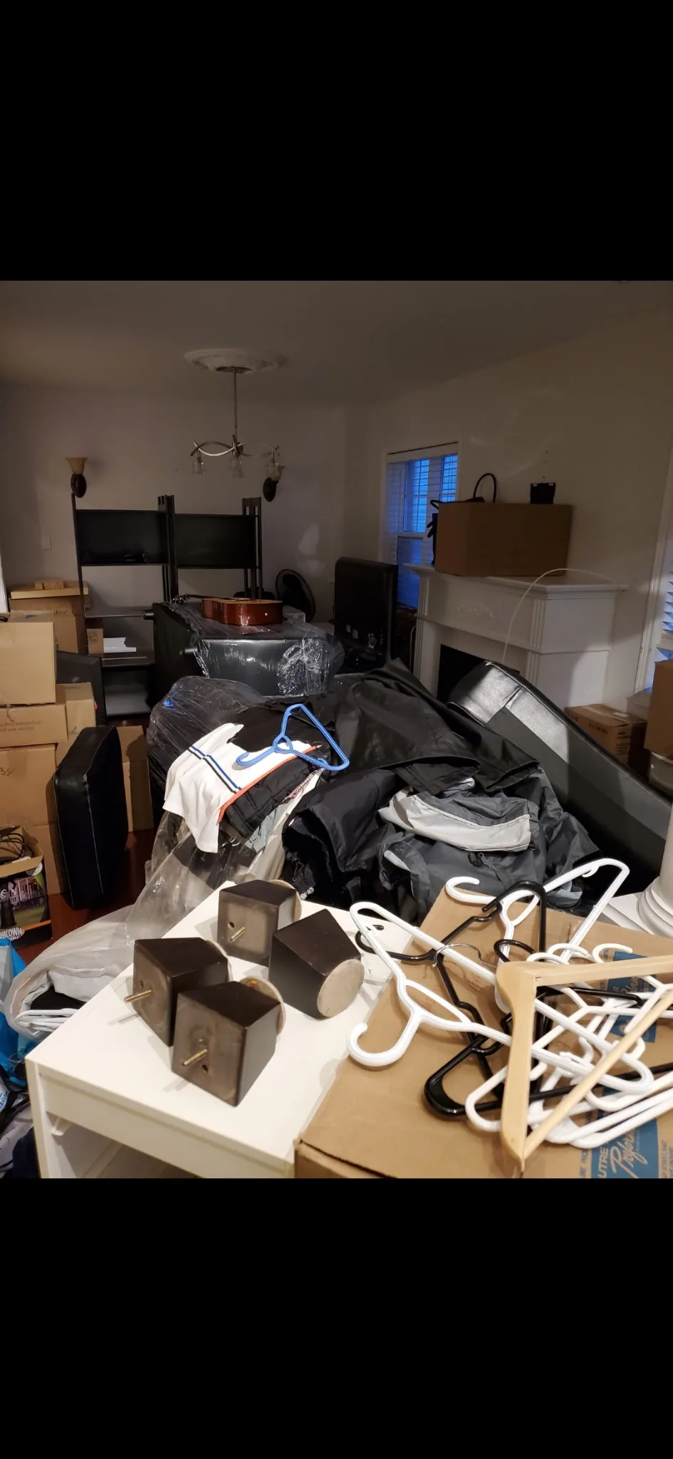 Cluttered living room before organizing