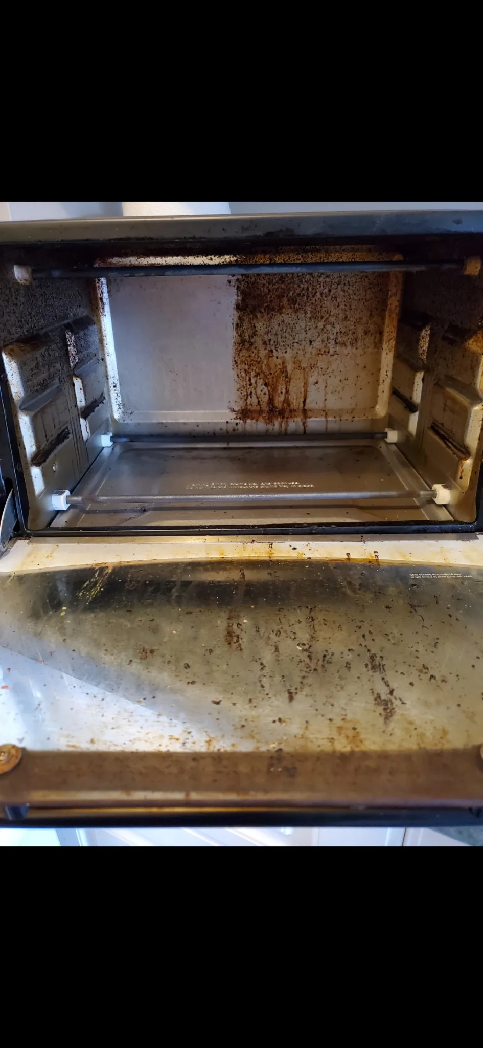 Dirty toaster oven before deep cleaning