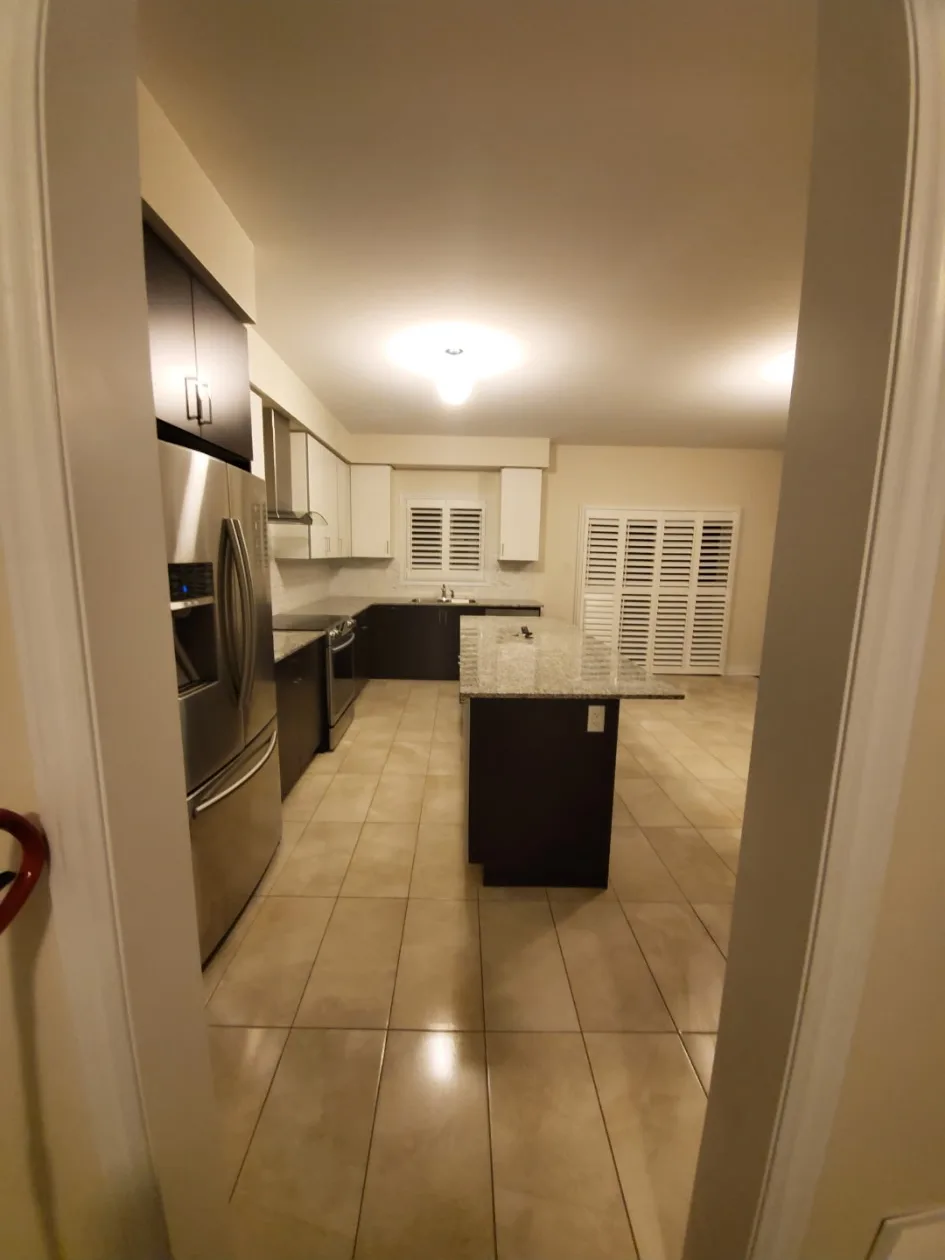 Clean kitchen viewed from doorway